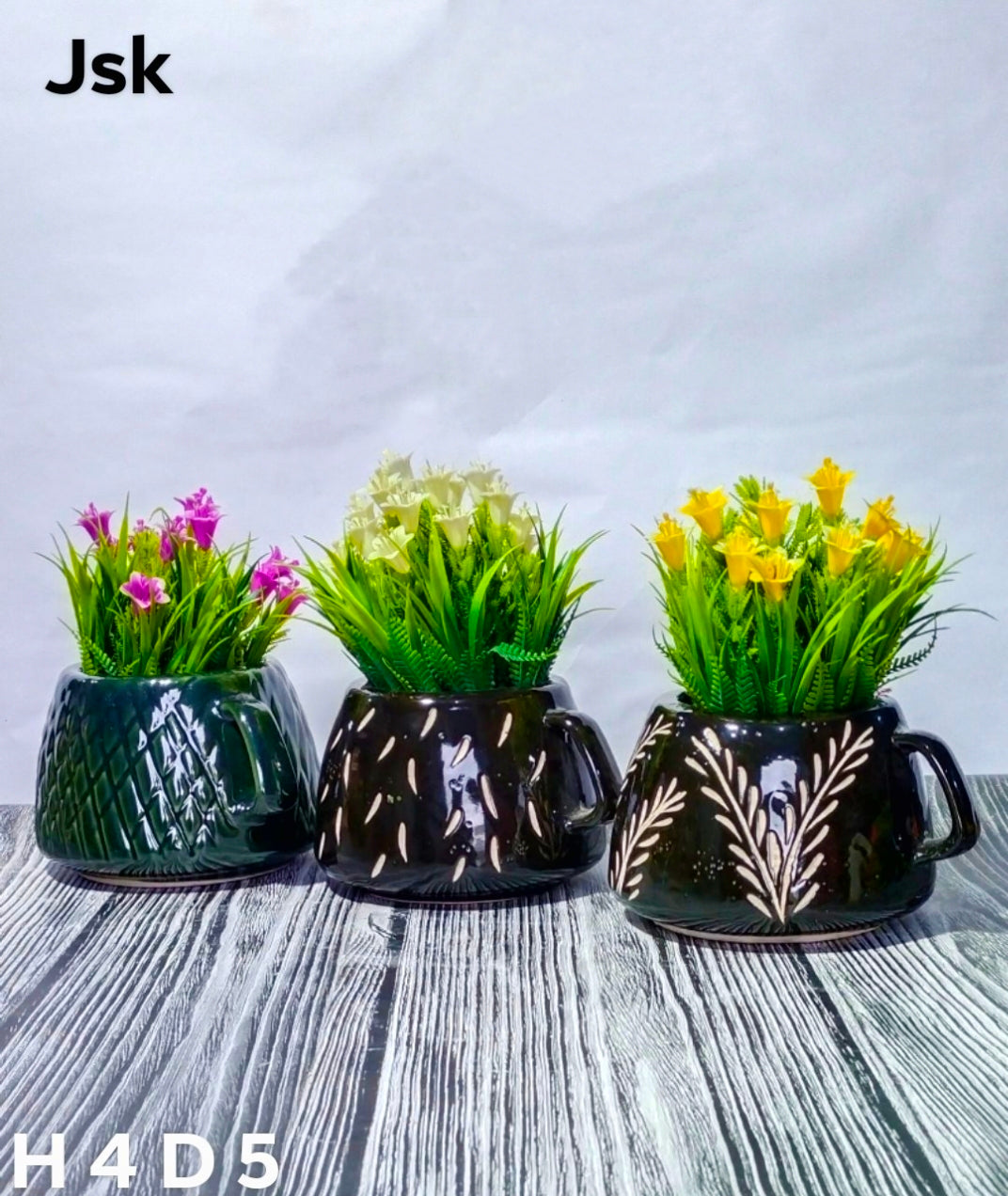 Collection of Ceramic Cup Pots in a gallery layout